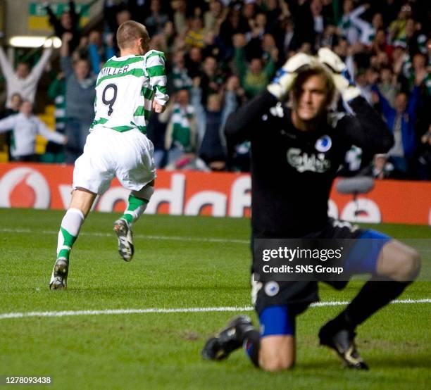 V FC COPENHAGEN .CELTIC PARK - GLASGOW.Celtic goalscorer Kenny Miller dashes off to celebrate as former Rangers team-mate Jesper Christiansen hangs...