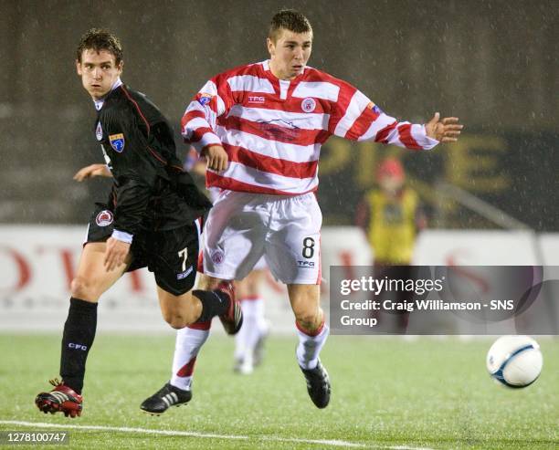 V CLYDE .NEW DOUGLAS PARK - HAMILTON .Craig Bryson gets close to Hamilton star James McArthur