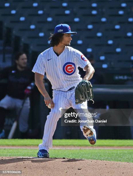 Starting pitcher Yu Darvish of the Chicago Cubs delivers the ball against the Miami Marlins during Game Two of the National League Wild Card Series...