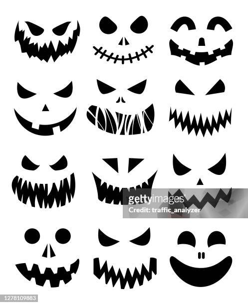 jack o lanterns - scary pumpkin faces stock illustrations