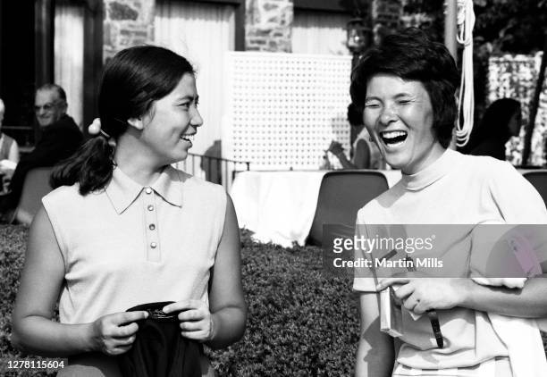 Hisako "Chako" Higuchi of Japan has a laugh with a fellow golfer during the 1972 U.S. Women's Open Golf Championship on July 1, 1972 at the Winged...