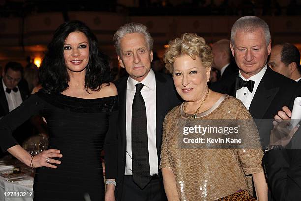 Catherine Zeta-Jones, Michael Douglas, Bette Midler, and Martin von Haselberg attend a dinner for the 26th annual Rock and Roll Hall of Fame...