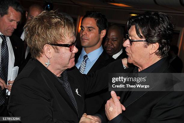 Elton John and Robbie Robertson attend a dinner for the 26th annual Rock and Roll Hall of Fame Induction Ceremony at The Waldorf=Astoria on March 14,...