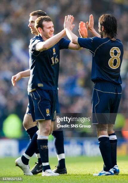 V GEORGIA .HAMPDEN - GLASGOW .Craig Beattie celebrates his goal with Scotland team-mate Paul Hartley.