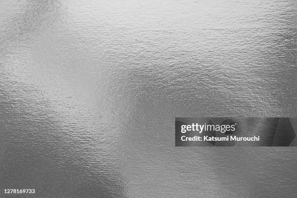 silver metallic texture background - carta stagnola foto e immagini stock