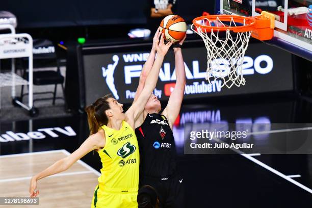 Breanna Stewart of the Seattle Storm deflects the shot from Carolyn Swords of the Las Vegas Aces during the first half of Game 1 of the WNBA Finals...