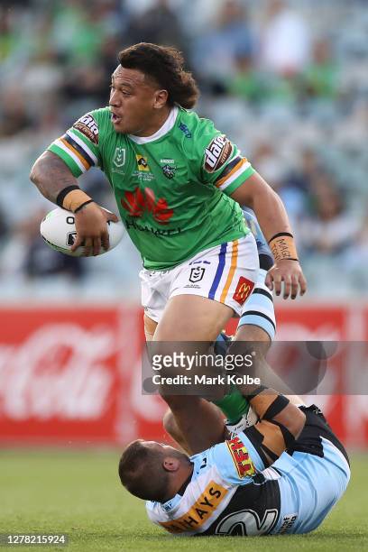 Josh Papalii of the Raiders is tackled during the NRL Elimination Final match between the Canberra Raiders and the Cronulla Sharks at GIO Stadium on...