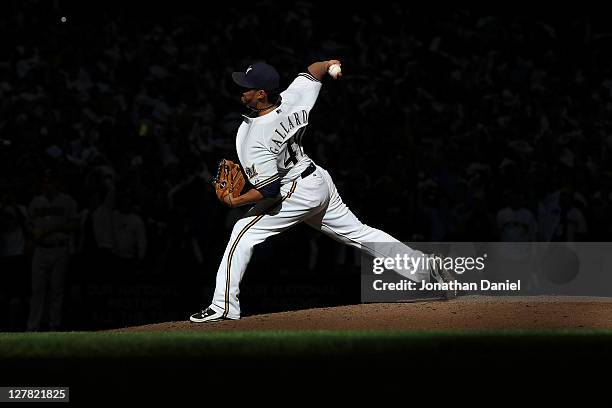 Yovani Gallardo of the Milwaukee Brewers throws a pitch during Game One of the National League Division Series against the Arizona Diamondbacks at...