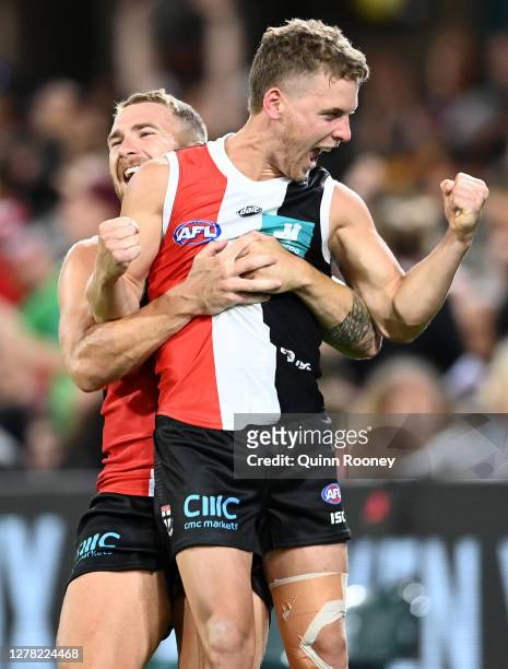 Jack Lonie of the Saints and Dean Kent of the Saints celebrate during the AFL Second Elimination Final match between the St Kilda Saints and the...