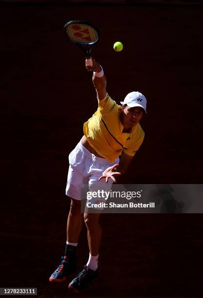 Daniel Altmaier of Germany serves during his Men's Singles third round match against Matteo Berrettini of Italy on day seven of the 2020 French Open...