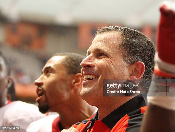 Greg Schiano, head coach of the Rutgers Scarlet Knights celebrates after an over time win against the Syracuse Orange on October 1, 2011 at the...