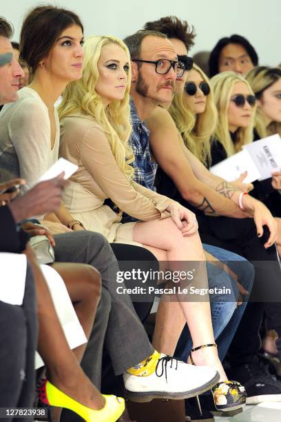 Bianca Brandolini, Lindsay Lohan and Terry Richardson attend the Dw by Kanye West Ready to Wear Spring / Summer 2012 show during Paris Fashion Week...