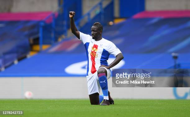 Mamadou Sakho of Crystal Palace takes a knee in support of the black lives matter movement prior to the Premier League match between Chelsea and...