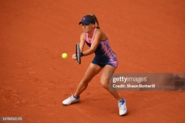 Irina Bara of Romania plays a backhand during her Women's Singles third round match against Sofia Kenin of The United States of America on day seven...