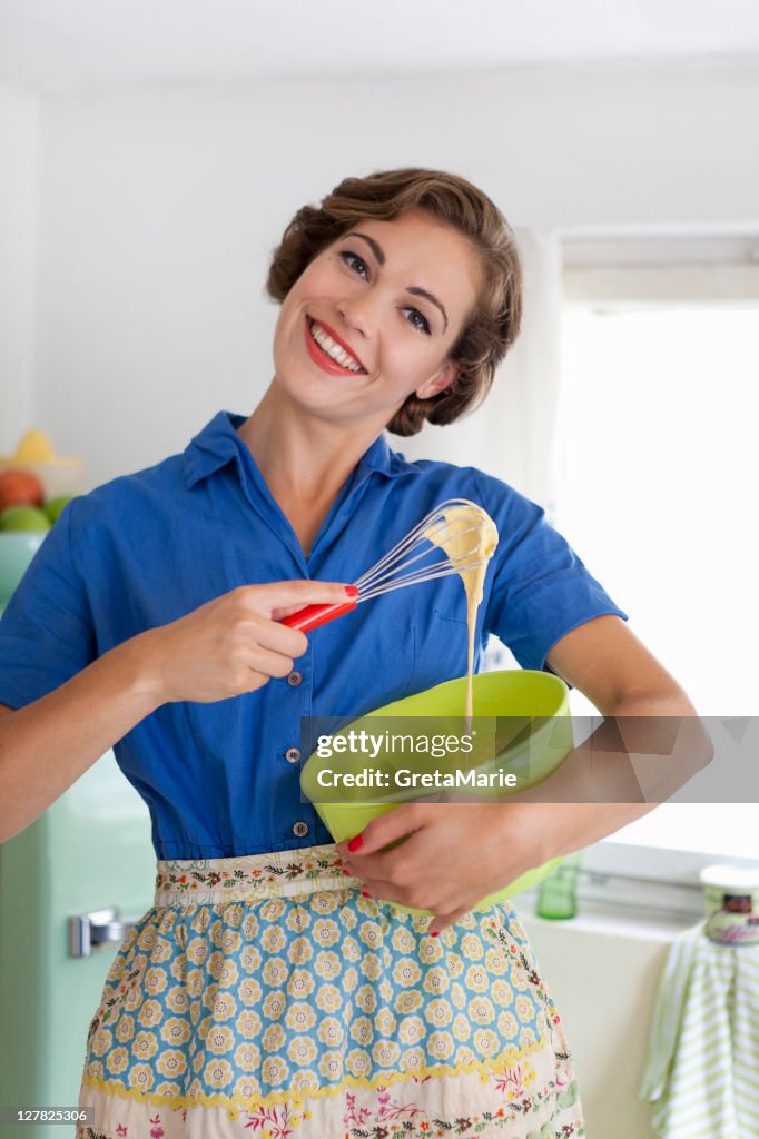 Woman baking in kitchen