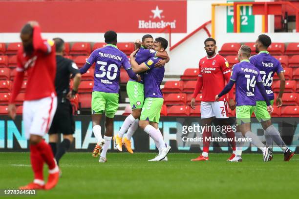 Nahki Wells of Bristol City celebrates with teammates after scoring his sides second goal during the Sky Bet Championship match between Nottingham...