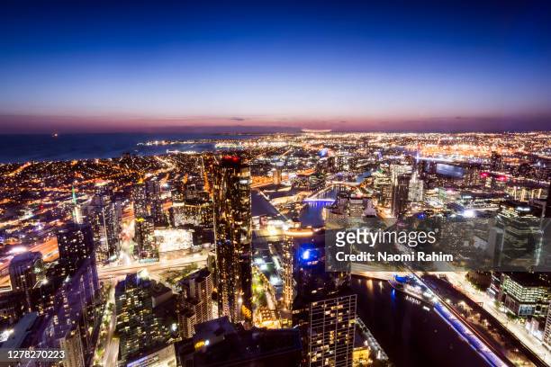 night lights of melbourne city at sunset - melbourne property foto e immagini stock