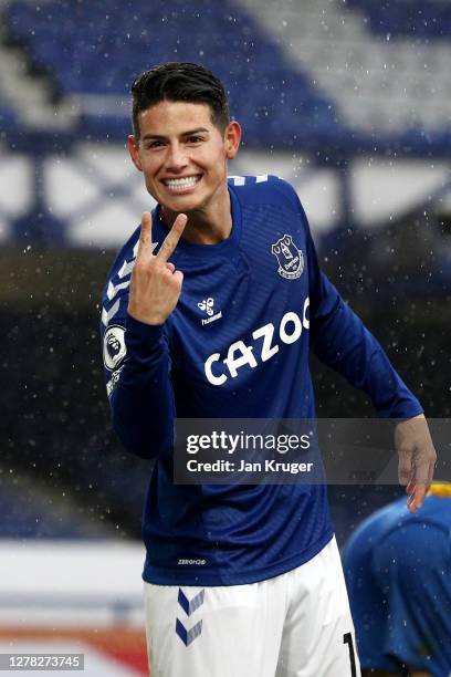 James Rodriguez of Everton celebrates after scoring his team's fourth goal during the Premier League match between Everton and Brighton & Hove Albion...