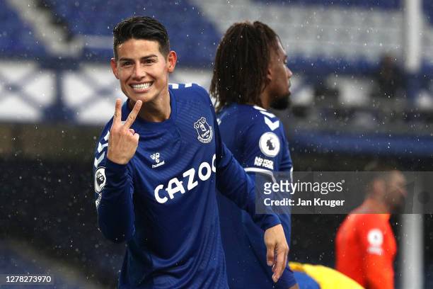 James Rodriguez of Everton celebrates after scoring his team's fourth goal during the Premier League match between Everton and Brighton & Hove Albion...