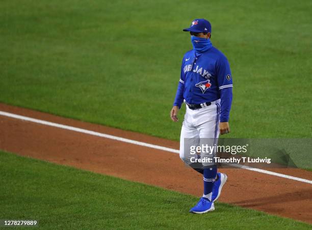 Manager Charlie Montoyo of the Toronto Blue Jays walks off the field against the Baltimore Orioles at Sahlen Field on September 25, 2020 in Buffalo,...