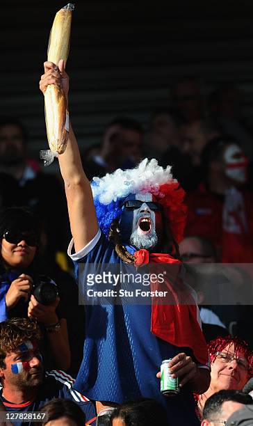 France fan enjoys the pre-match atmosphere prior to kickoff during the IRB 2011 Rugby World Cup Pool A match between France and Tonga at Wellington...