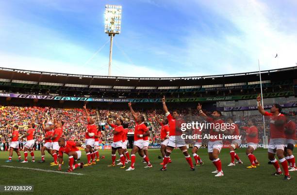 The Tonga team perform the Sipi Tau prior to kickoff during the IRB 2011 Rugby World Cup Pool A match between France and Tonga at Wellington Regional...