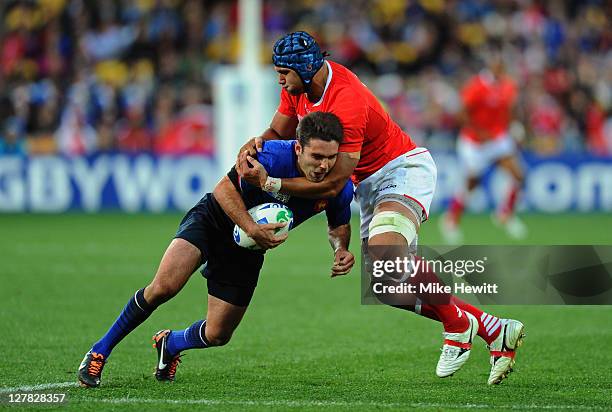 Dmitri Yachvili of France is brought down by Sione Kalamafoni of Tonga during the IRB 2011 Rugby World Cup Pool A match between France and Tonga at...