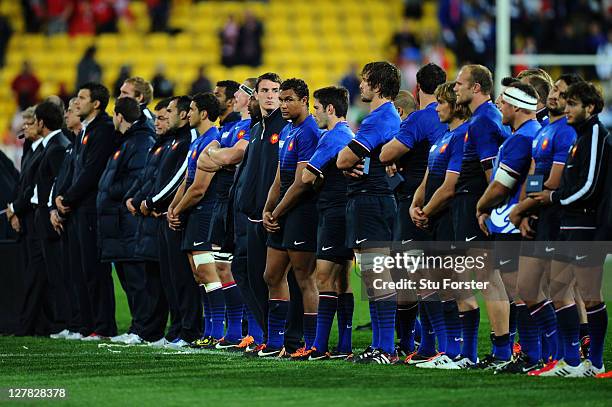 Dejected France players look following their team's 14-19 defeat during the IRB 2011 Rugby World Cup Pool A match between France and Tonga at...