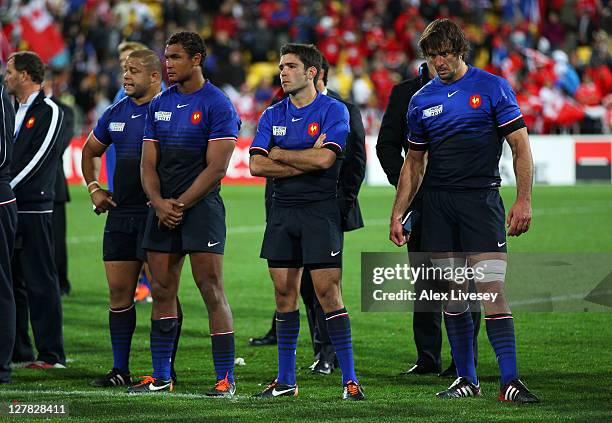 Dejected France players look on following their team's 14-19 defeat during the IRB 2011 Rugby World Cup Pool A match between France and Tonga at...