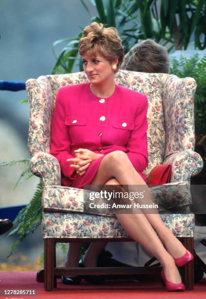 Diana, Princess of Wales, wearing a pink suit with gold buttons designed by Paul Costelloe, during a visit to Sudbury on October 24, 1991 in Sudbury,...