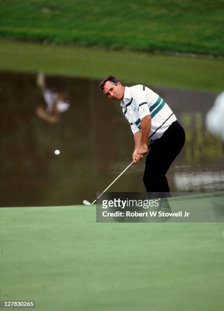 American golfer Hubert Green chips the ball from the from seventeenth green of TPC at River Highlands during the Canon - Sammy Davis Jr Greater...