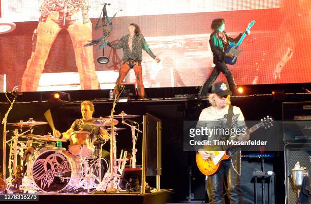 Joey Kramer, Steven Tyler, Joe Perry, and Brad Whitford of Aerosmith perform at Shoreline Amphitheatre on November 2, 2006 in Mountain View,...