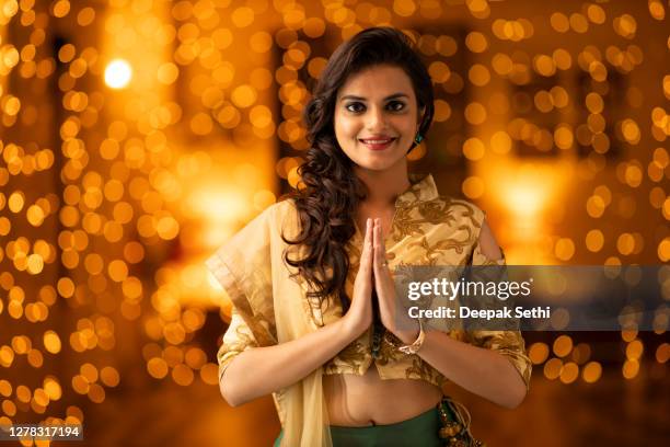 young woman diwali celebrate - stock photo - namaste greeting stock pictures, royalty-free photos & images