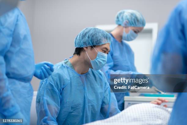 Nurses Isolation Nurse Isolation Gown Photos and Premium High Res Pictures - Getty Images