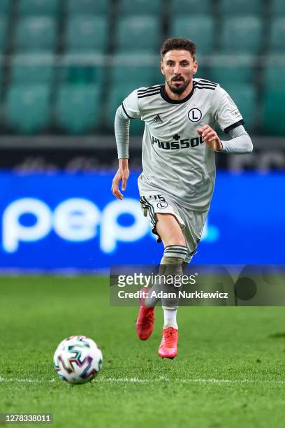 Filip Mladenovic of Legia Warsaw controls the ball during the UEFA Europa League play-off Qualification Round match between Legia Warszawa and...