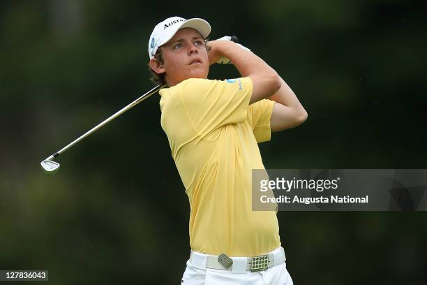 Cameron Smith of Australia plays his second shot on the first hole during day four of the 2011 Asian Amateur Championship at the Singapore Island...