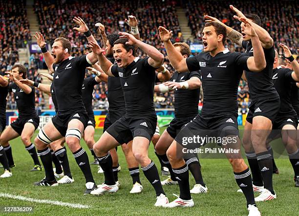 Kieran Read, Zac Guildford and Israel Dagg of the All Blacks perform the Haka prior to kickoff during the IRB Rugby World Cup Pool A match between...