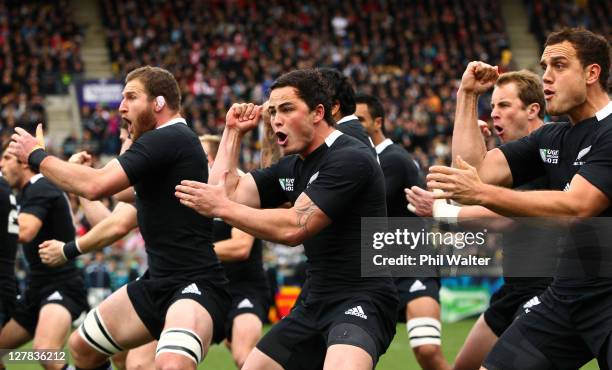 Kieran Read, Zac Guildford and Israel Dagg of the All Blacks perform the Haka prior to kickoff during the IRB Rugby World Cup Pool A match between...