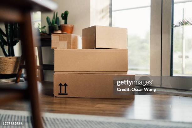 packages waiting on the doorstep - empty cardboard box stock pictures, royalty-free photos & images