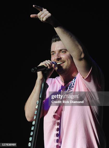 Singer/Songwriter Chris Young wearing pink performs during the 6th annual Susan G. Komen Concert for the Cure at the Roanoke Civic Center on...