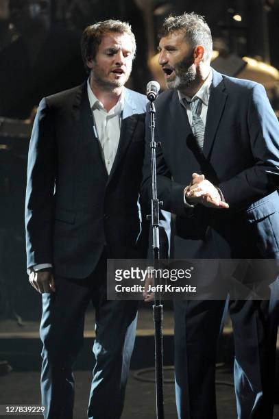 Joe Sumner and Jimmy Nail perform on stage during STING: 25th Anniversary/60th Birthday Concert to Benefit Robin Hood Foundation at Beacon Theatre on...