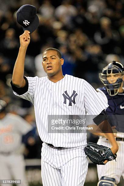 Ivan Nova of the New York Yankees salutes the crowd after being pulled from the game in the ninth inning of Game One of the American League Division...