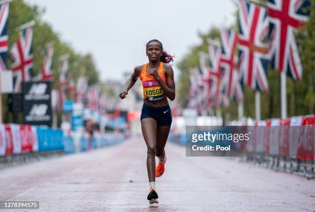 Brigid Kosgei of Kenya competes in the Elite Women's Field during the 2020 Virgin Money London Marathon around St James on October 04, 2020 in...