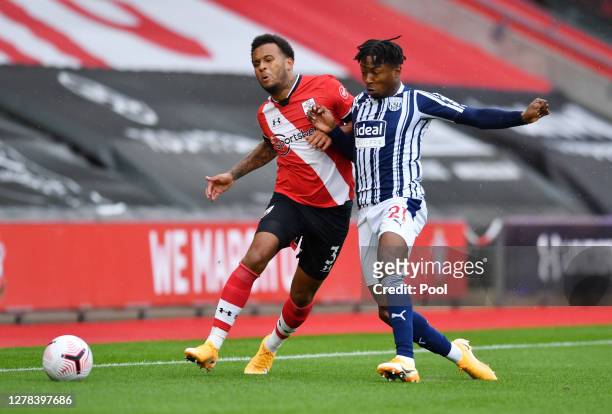Ryan Bertrand of Southampton battles for possession with Kyle Edwards of West Bromwich Albion during the Premier League match between Southampton and...