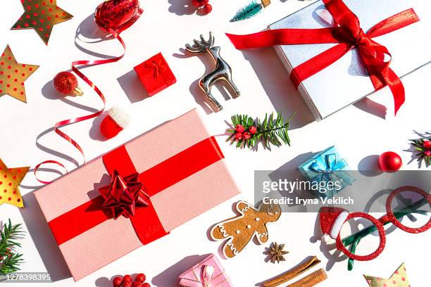 christmas decoration objects and gift box as holiday background. - christmas present isolated stock pictures, royalty-free photos & images