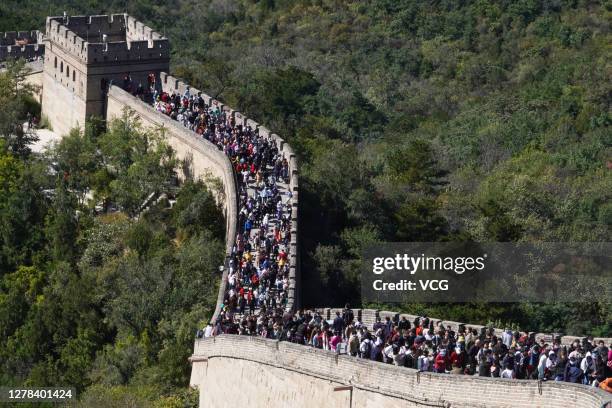 Tourists visit the Badaling Great Wall on the fourth day of the National Day and Mid-Autumn Festival holiday on October 4, 2020 in Beijing, China.