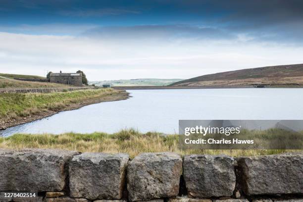 view of the reservoir; image taken from circular walk from withens clough reservoir, calderdale, west yorkshire, uk. september - reservoir stock pictures, royalty-free photos & images