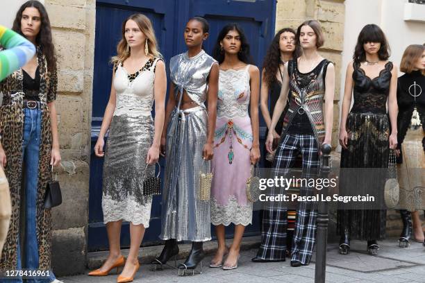 Christa Theret and models walk the runway during the Paco Rabanne Womenswear Spring/Summer 2021 show as part of Paris Fashion Week on October 04,...