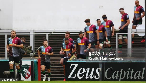 Chris Robshaw of Harlequins leads his team out for the last time on his 300th Premiership appearance during the Gallagher Premiership Rugby match...