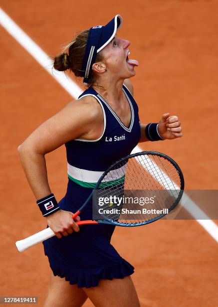 Nadia Podoroska of Argentina celebrates after winning match point during her Women's Singles fourth round match against Barbora Krejcikova of Czech...